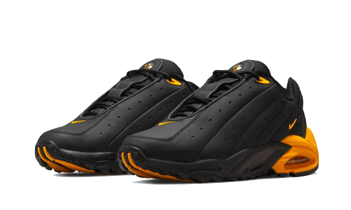 NOCTA Hot Step Air Terra Black University Gold Kickzmi